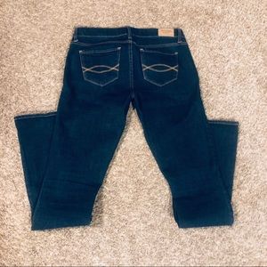 Low rise, dark wash, flare stretch jeans